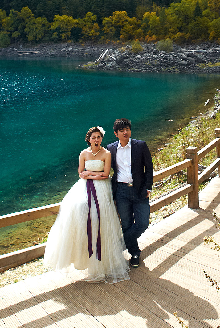 bride is tired - wedding photo at Jiuzhaigou