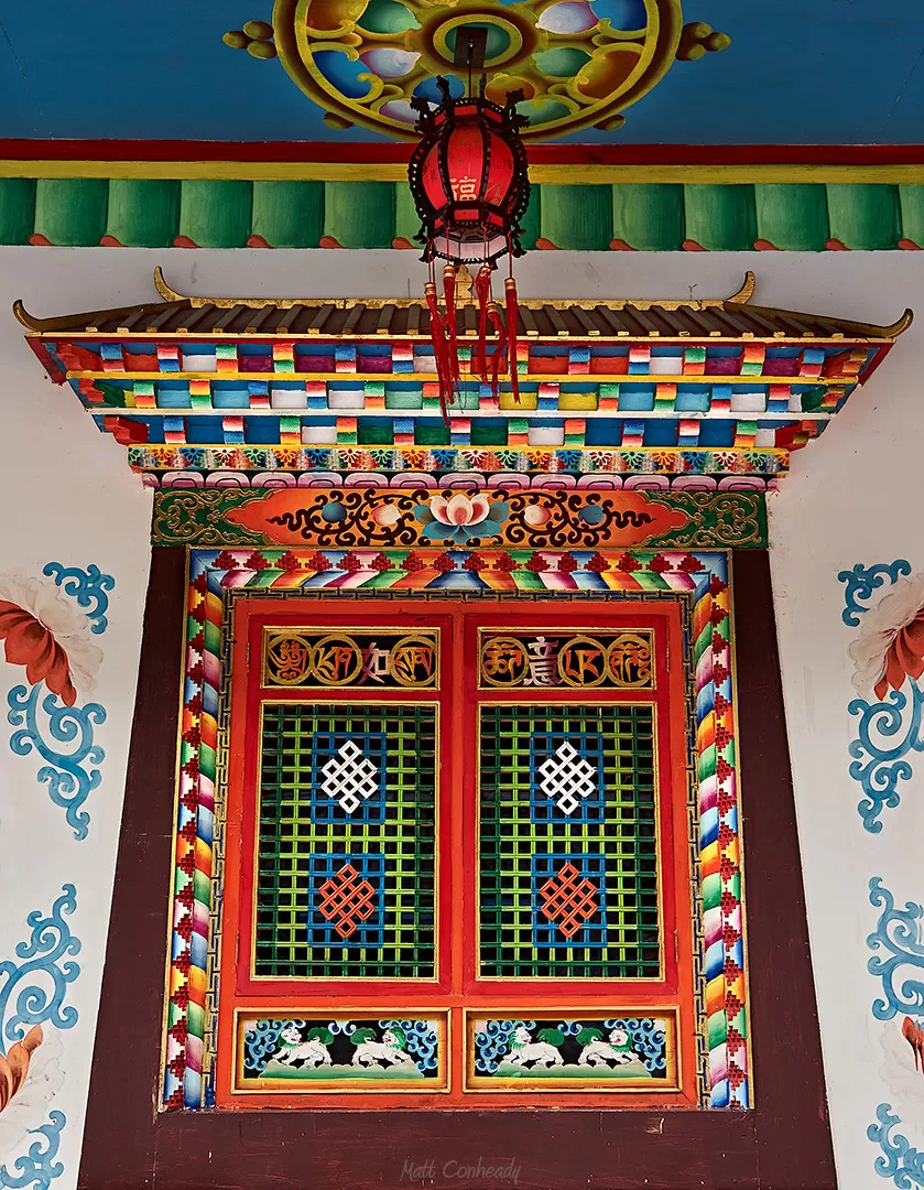 brightly painted tibetan window