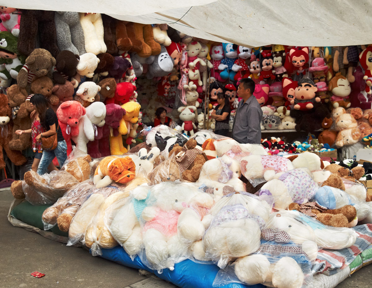 Stuffed animal vendor at the lotus pond market