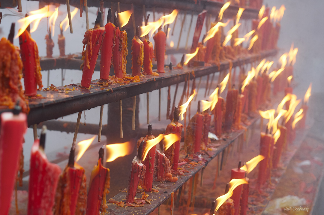 burning candles on Mt Emei 