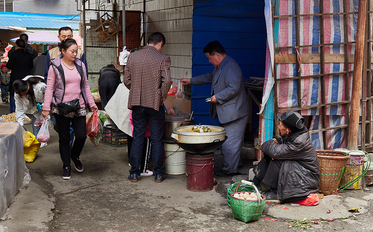 A small vendor at the Zhangjiajie Open Air Market