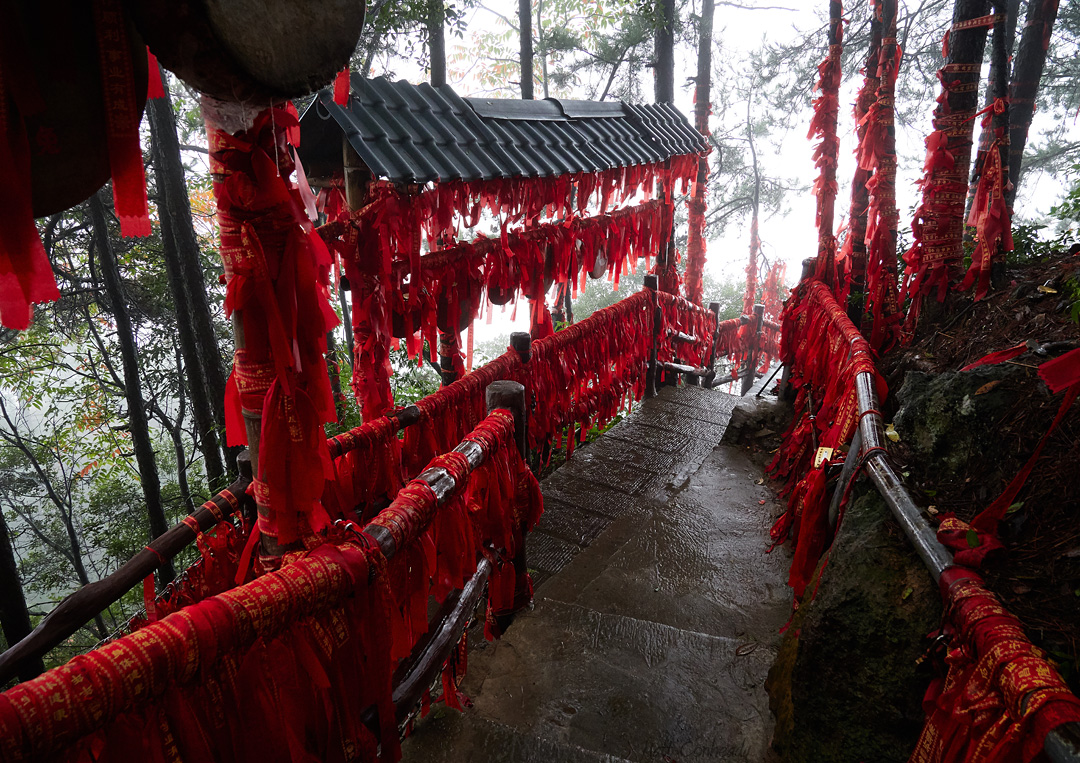 the Catching the Stars trail in Zhangjiajie is covered in red ribbons for good luck